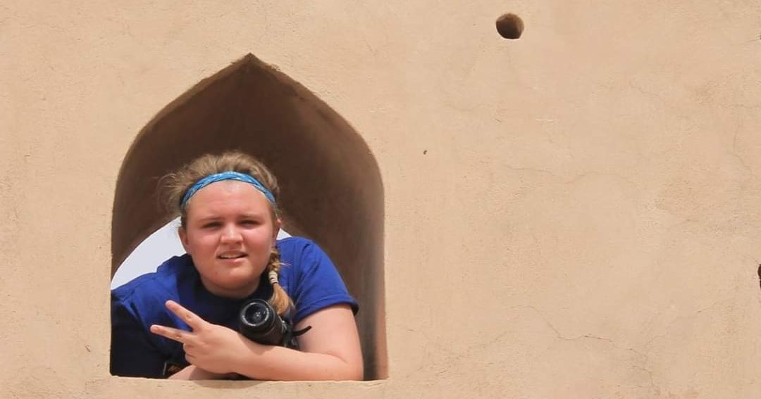 APS Class of 2012 graduate Charlie Creech is pictured at a fort in Ibri, Oman, where she studied abroad for five months.